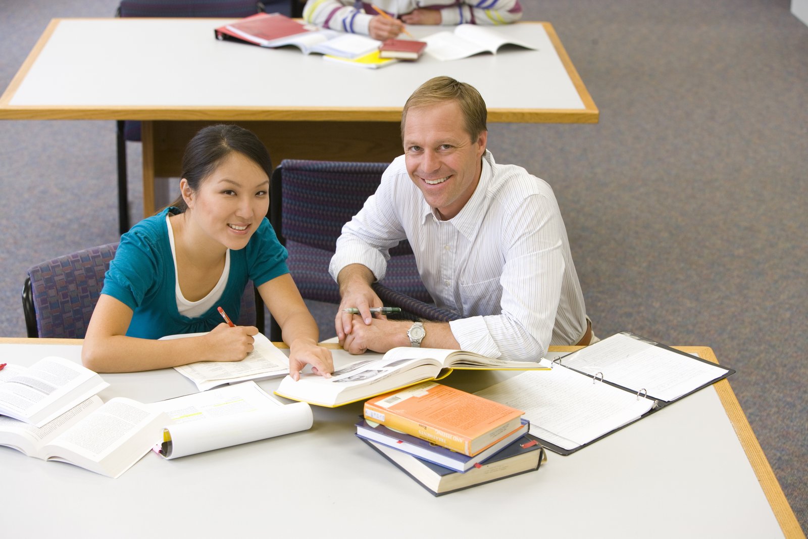 Tutor working one-on-one with a student
